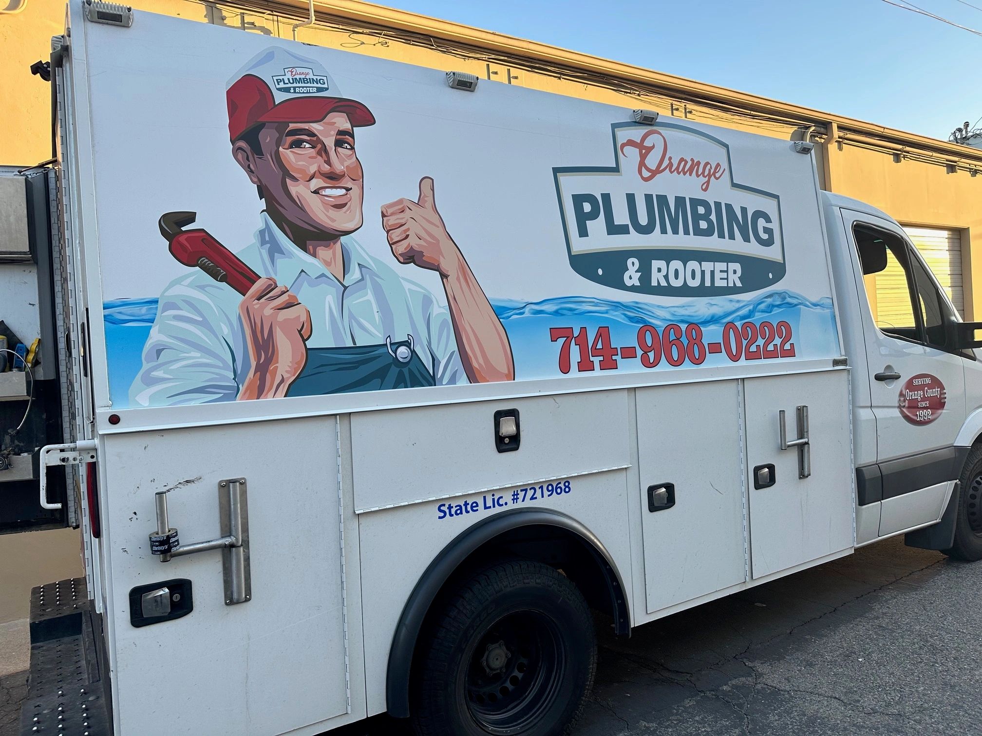 Orange Plumbing and Rooter service van